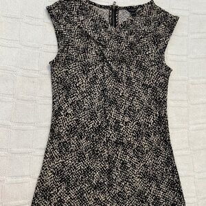 Sleeveless top with back zipper